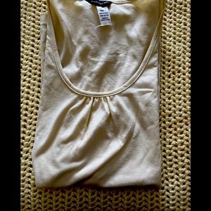 Cream tank top with gathered front neckline.   Never worn.  Says size 14.